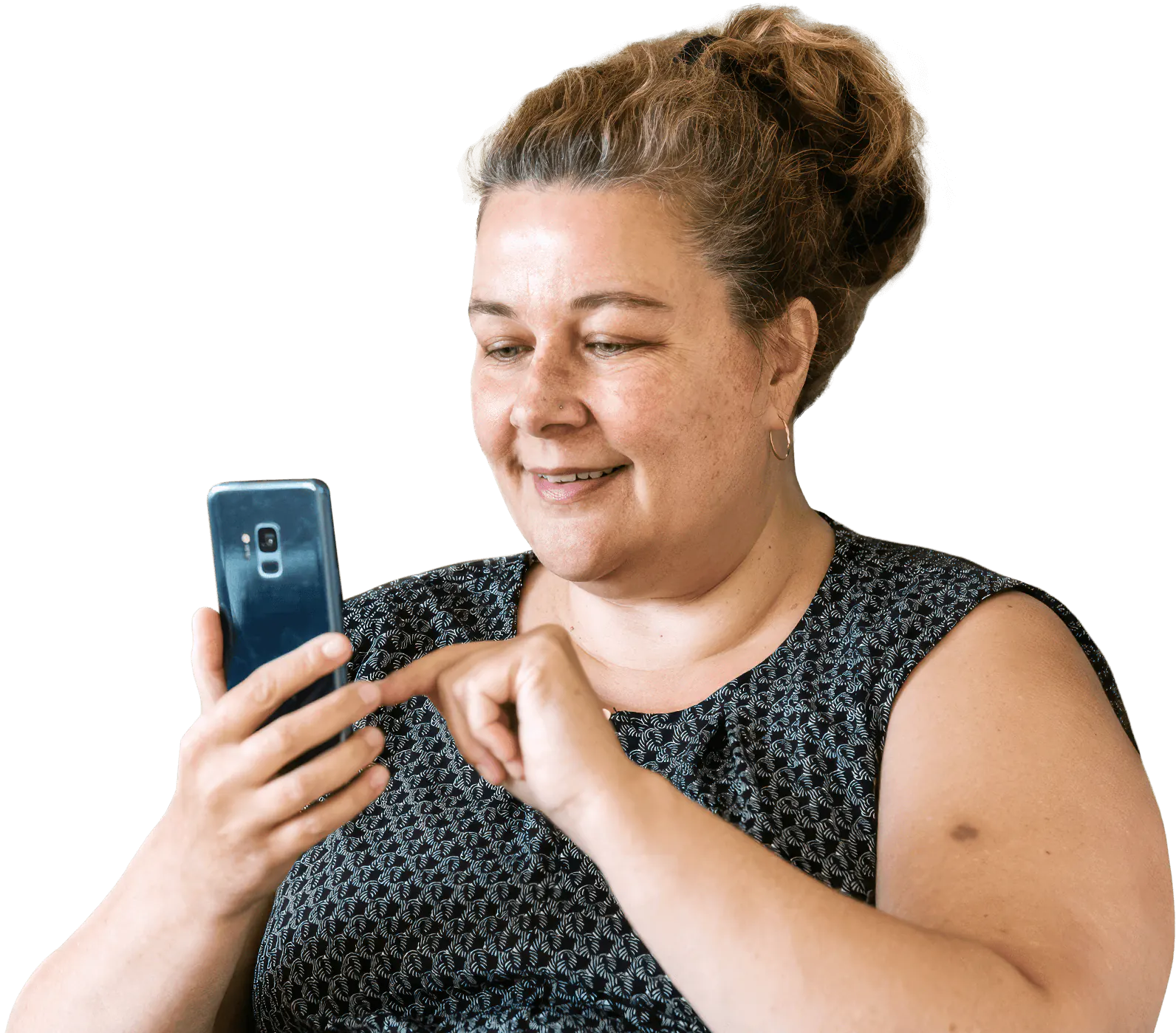 Lady smiling while looking at Liva app on her android phone.
